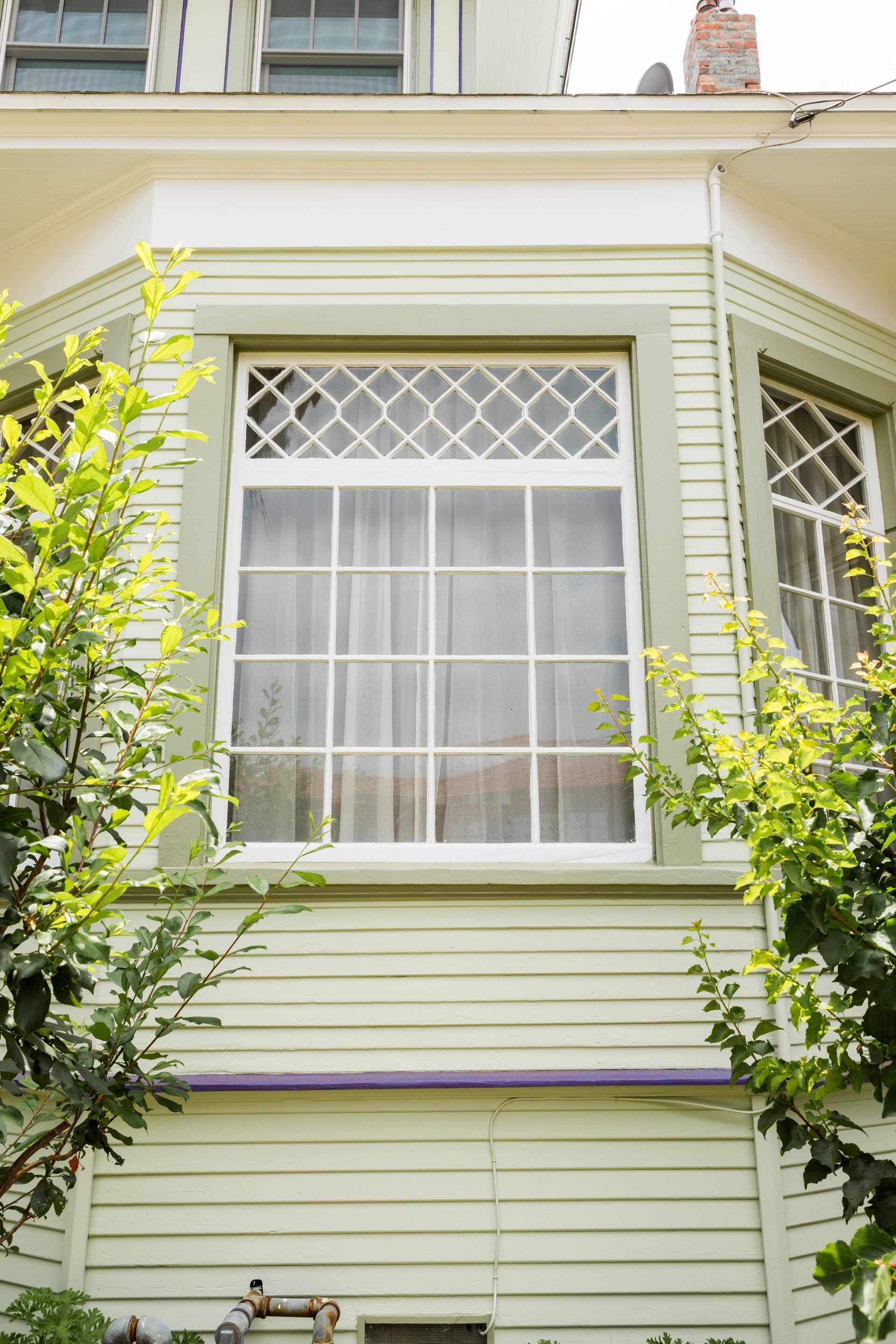 A large window on the side of a house