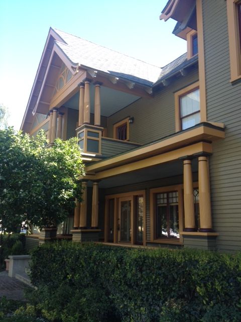 A large house with a large porch and columns
