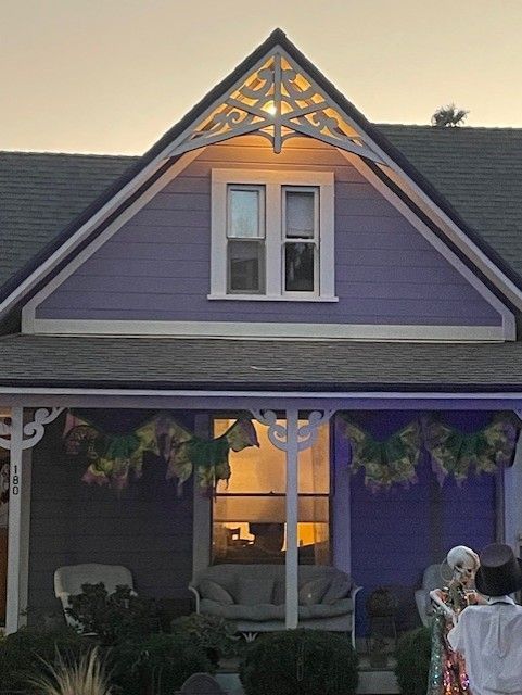 The roof of a house with a cross on it