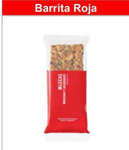 Red packaged granola bar labeled "Muecas" with "Manzana y Arándanos".