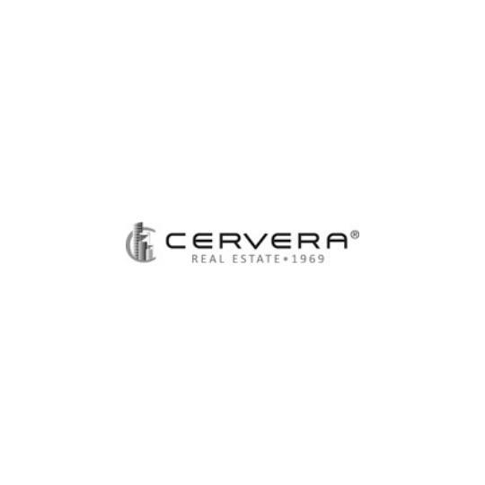 A black and white logo for cervera real estate