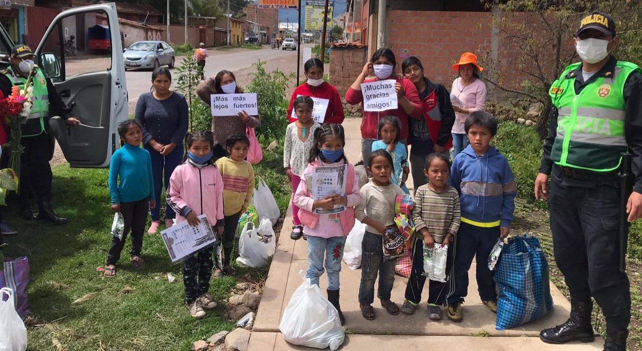 Children asking for help and holding signs