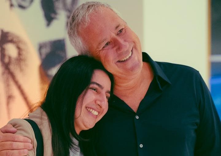Maria Arriaga orphaned starfish foundation scholarship recipient and nursing student and andy stein
