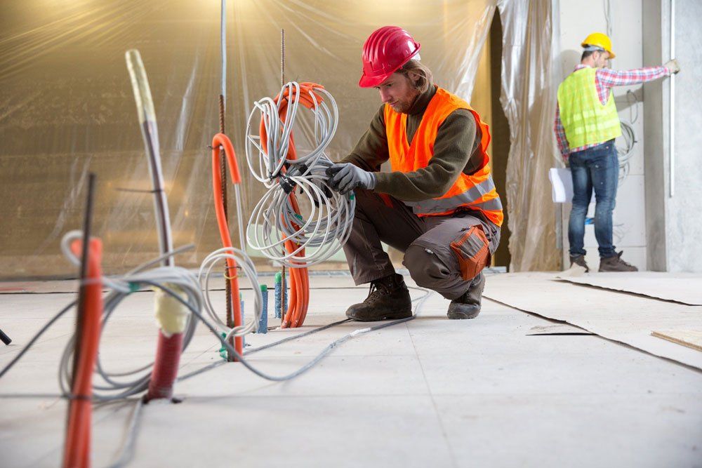 Civil engineer working on a construction site — Commercial Electrical in Tamworth, NSW