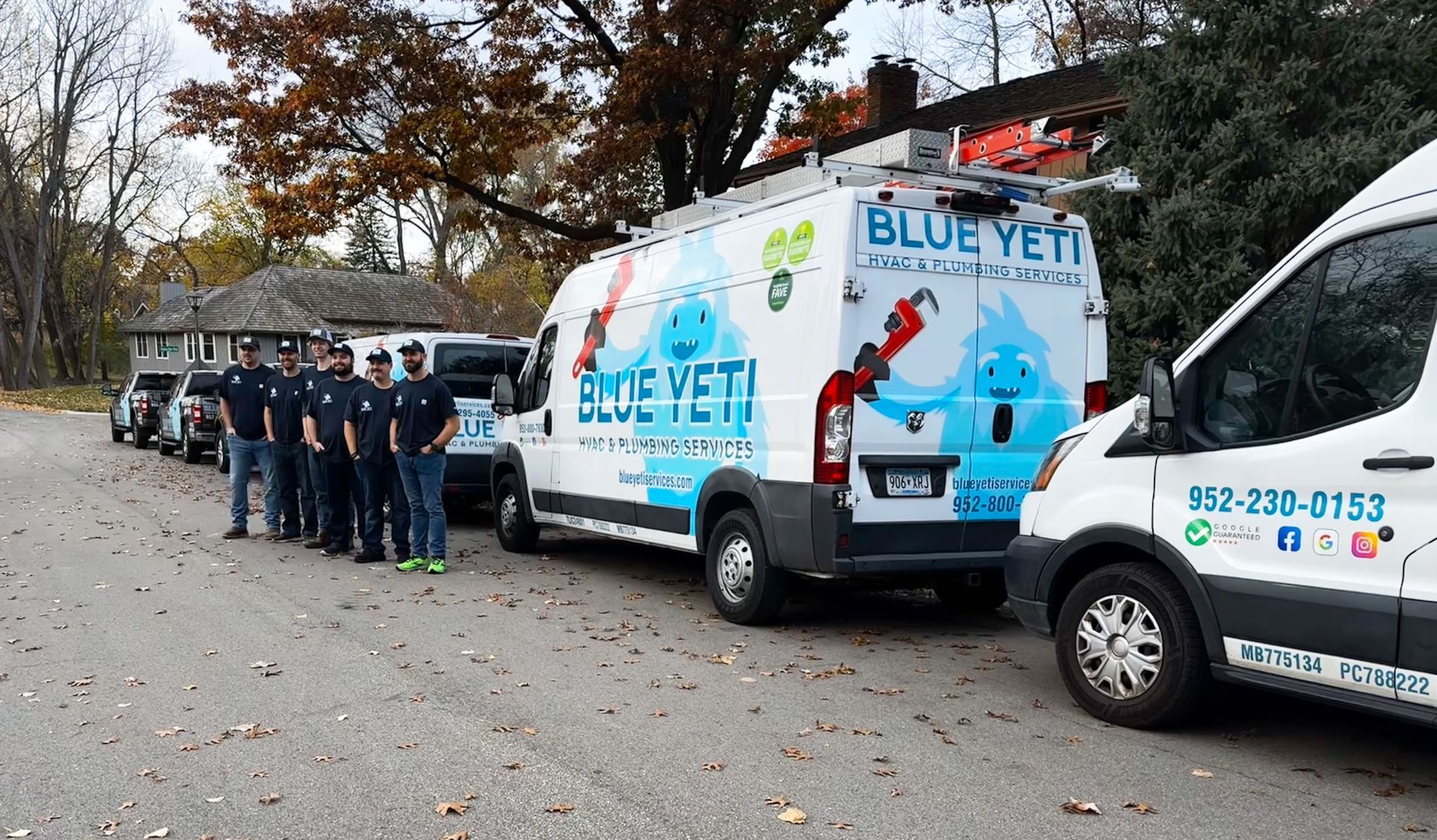 Blue Yeti technicians in front of their work trucks in St. Louis.