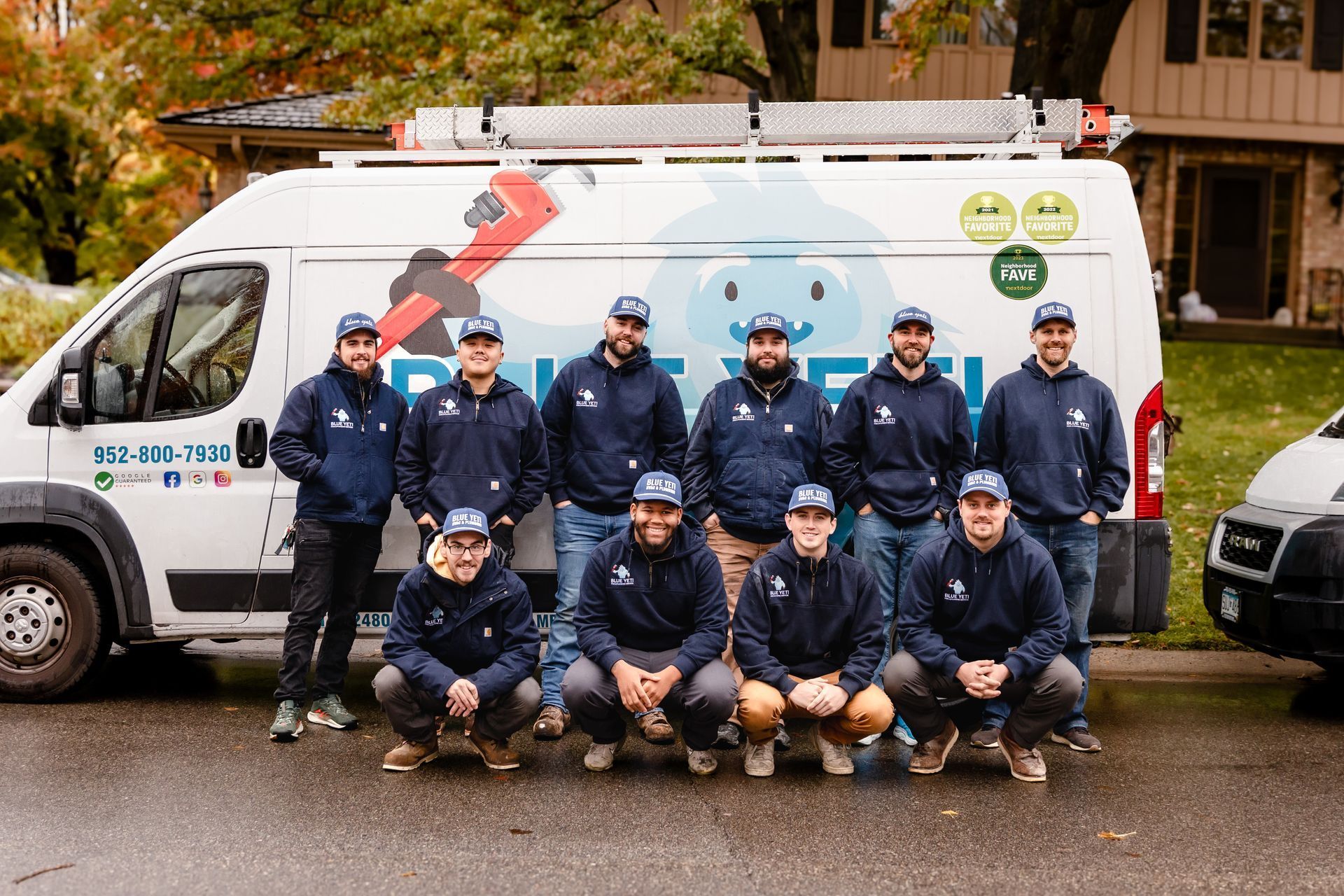 Blue Yeti HVAC Plumbing HVAC technicians posing with their work van