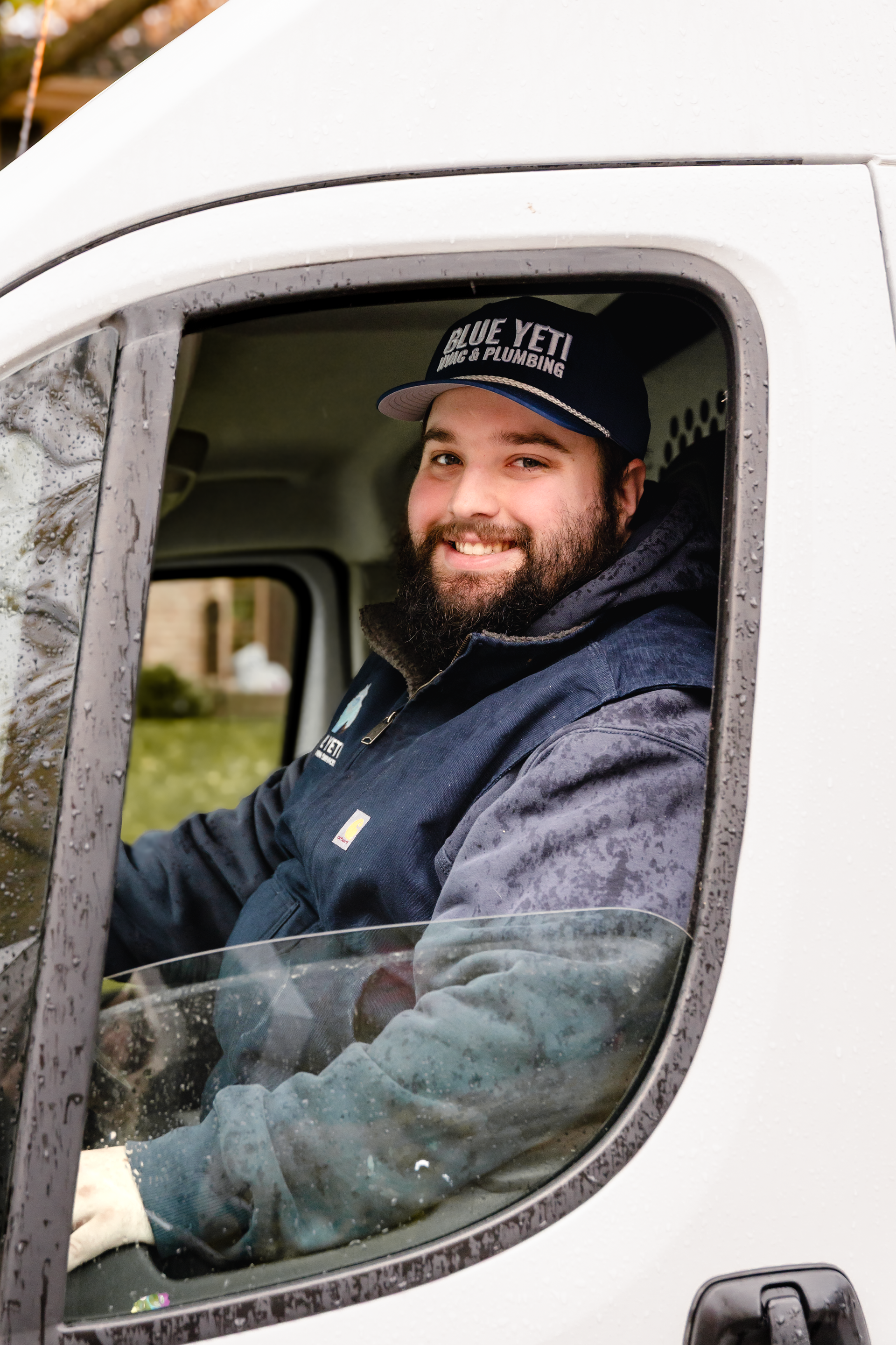blue yeti services team maintaining an air conditioner