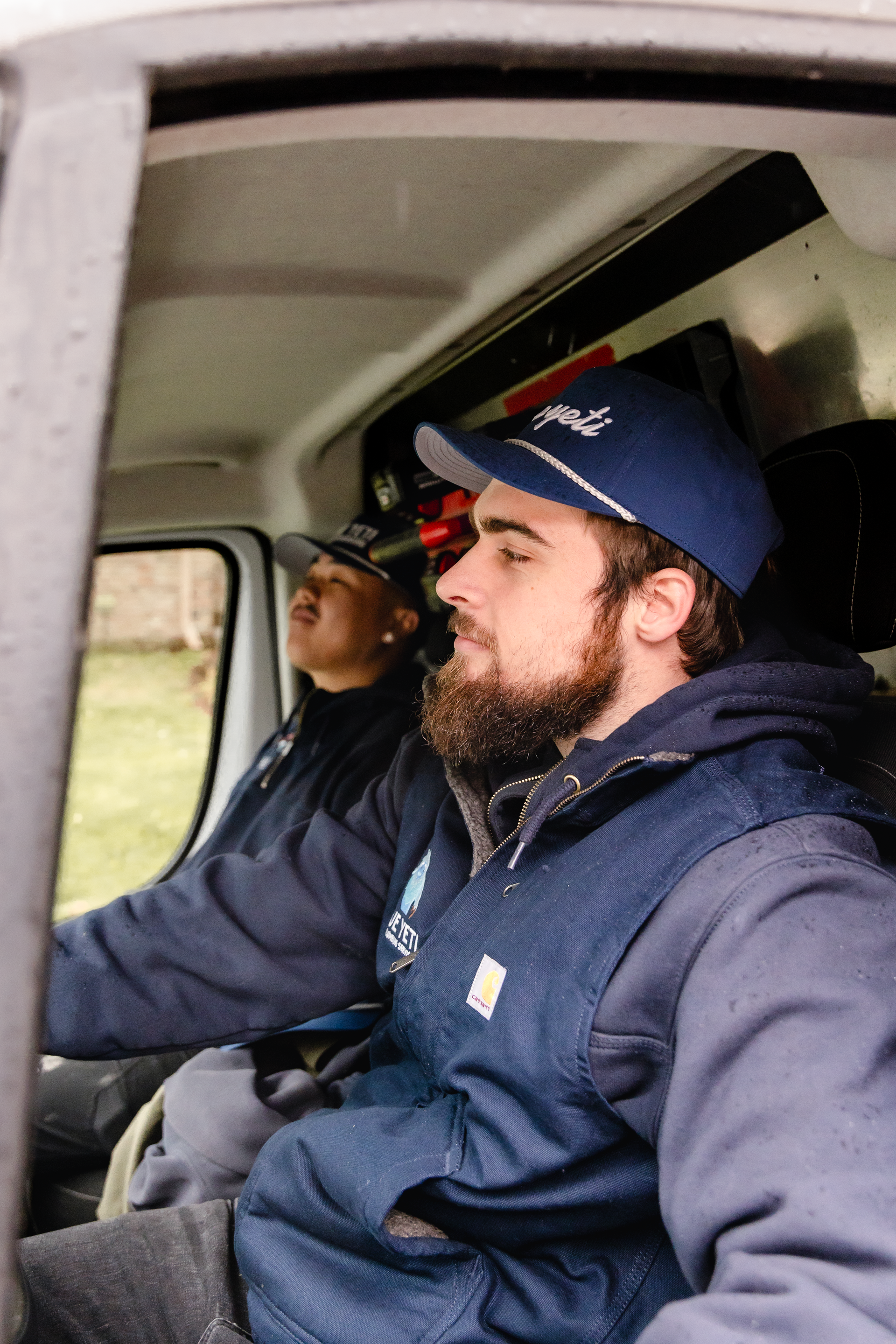 Blue Yeti Service technician working on an ac unit outside