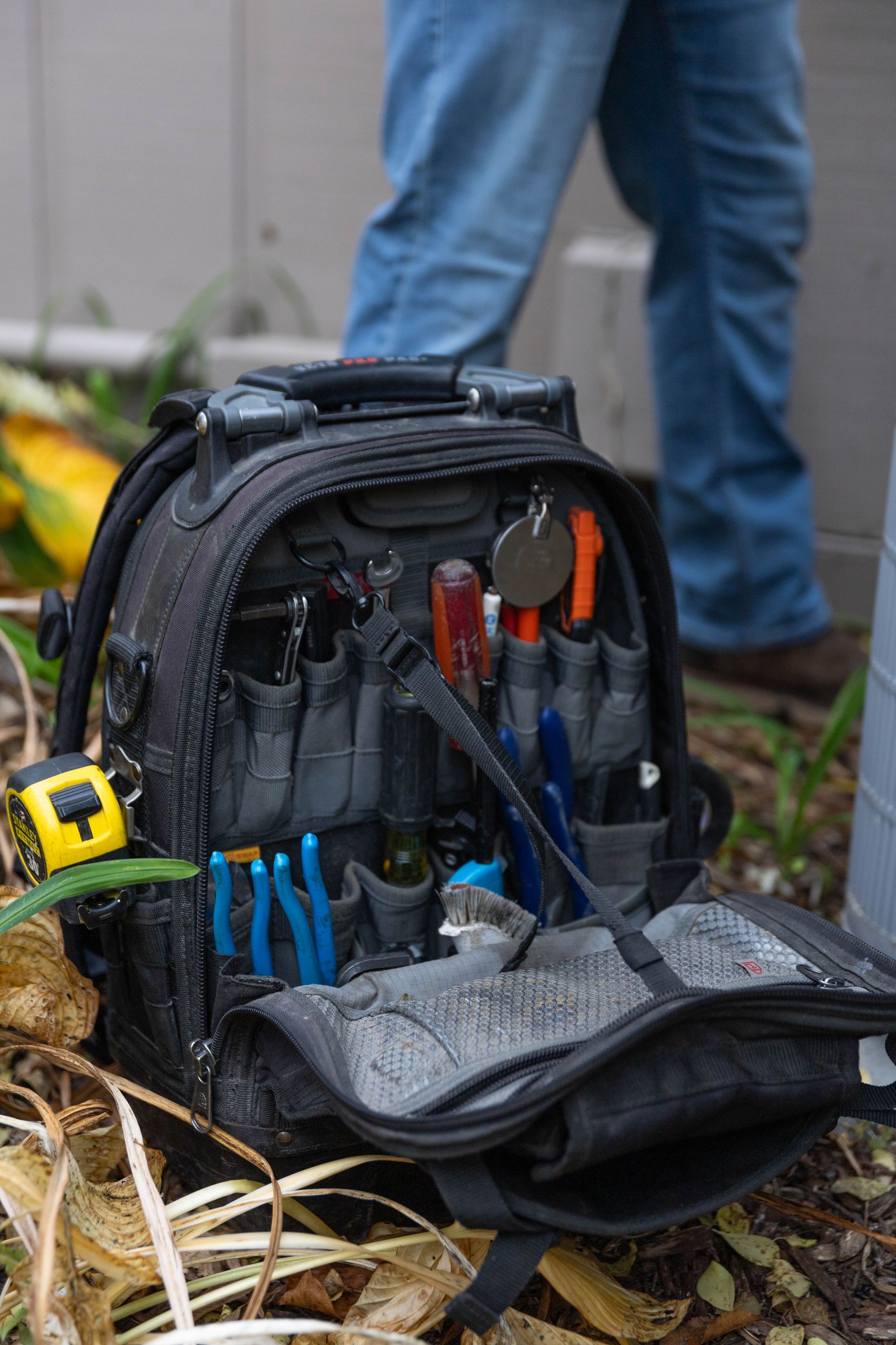 Blue Yeti Services technicians in front of their work trucks
