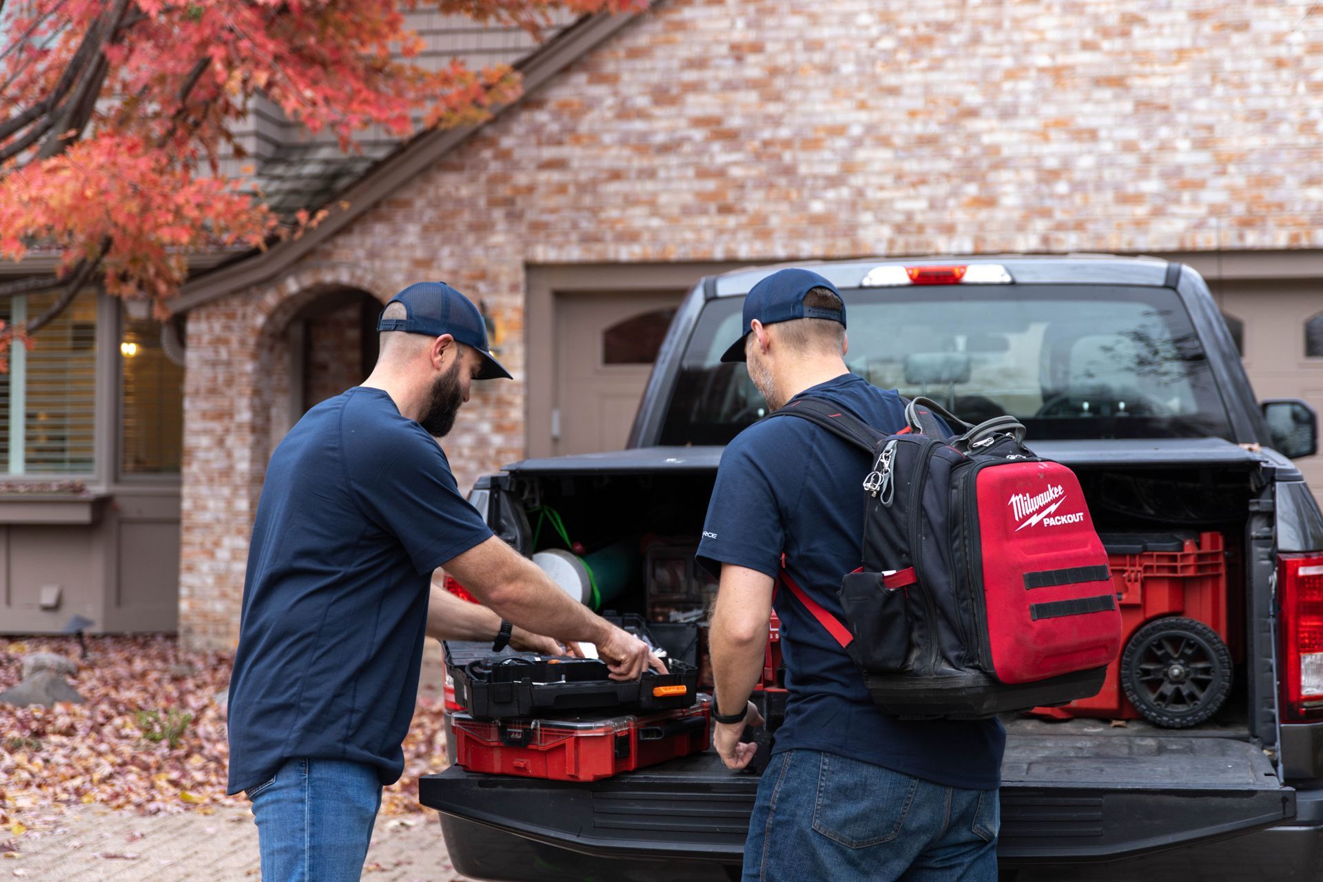 Blue Yeti Service technician in front of work vehicle