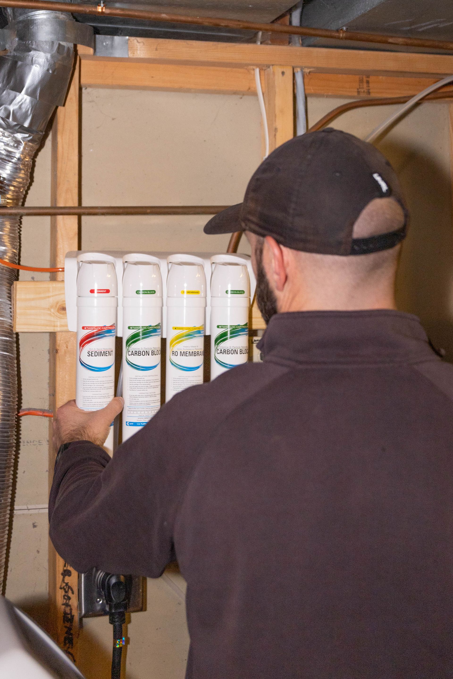 two Blue Yeti Service technician working on an ac unit outside