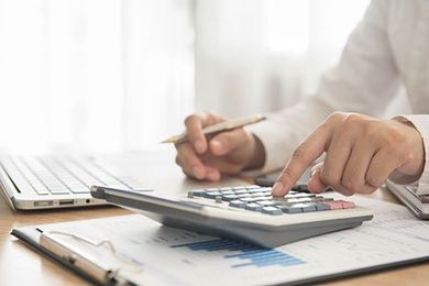 Calculator and Money — Bookkeeping Services in Fort Collins, CO