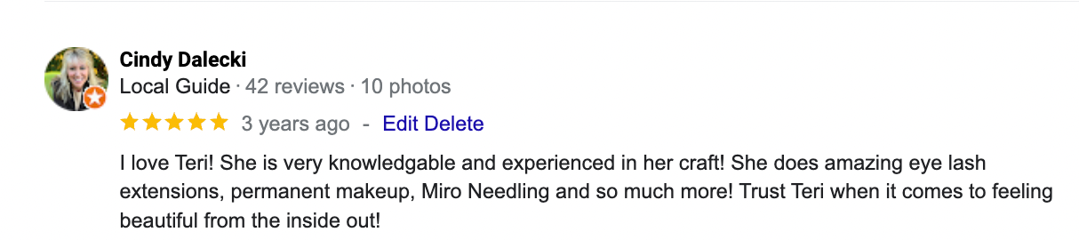 A blurred image of a person 's review on a google review page.