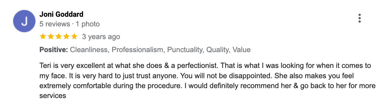 A blurred image of a person 's review on google.