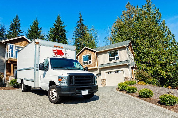 White Moving Truck at Driveway — Madison Heights, VA — In N Out Moving LLC