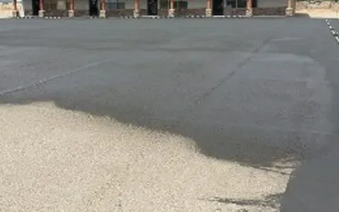 Asphalt Sealing in Front of a Commercial Building — Prescott, AZ — Maurer Sealing & Striping