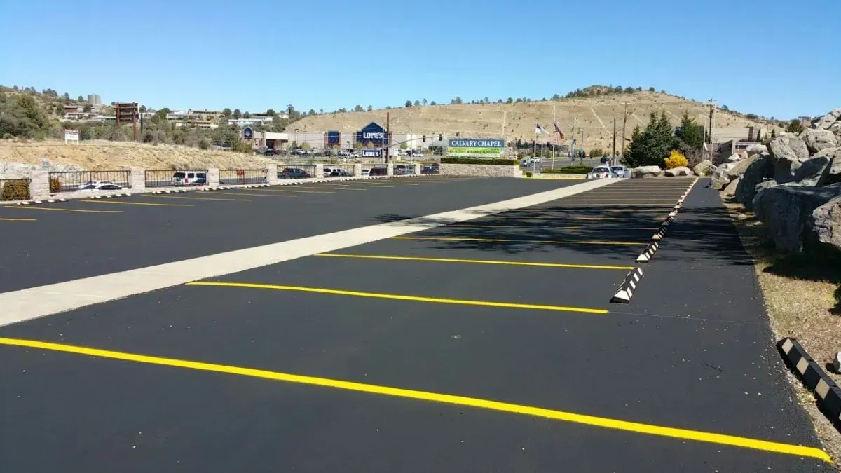 A Parking Lot with a Mountain in the Background — Prescott, AZ — Maurer Sealing & Striping
