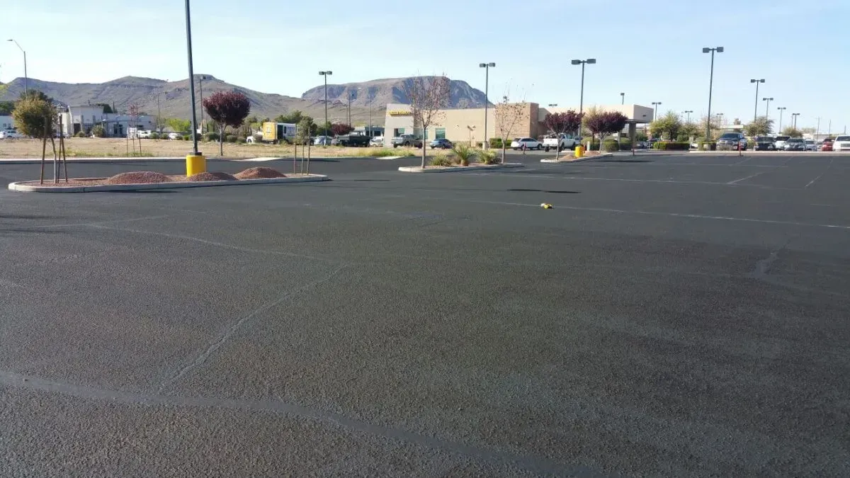 An Empty Parking Lot with Mountains in the Background — Prescott, AZ — Maurer Sealing & Striping