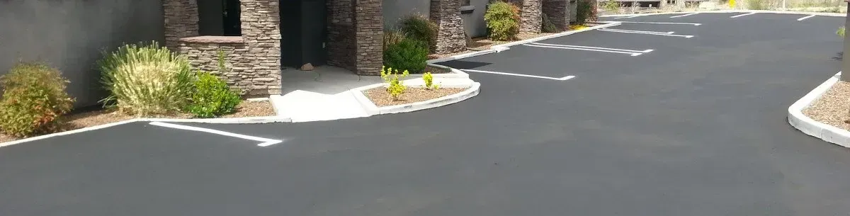 An Asphalt Driveway in Front of the Modern House — Prescott, AZ — Maurer Sealing & Striping