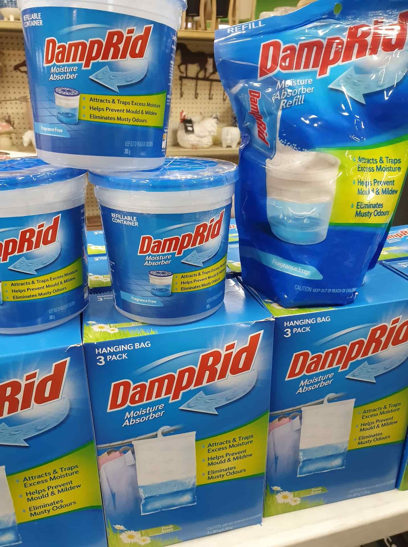 A Shelf Filled With Containers And Bags Of DampRid — Maleny Hardware & Rural Supplies In Maleny, QLD