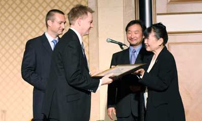 TJCS Hagiwara Award winner Colin Walker receiving his award on stage