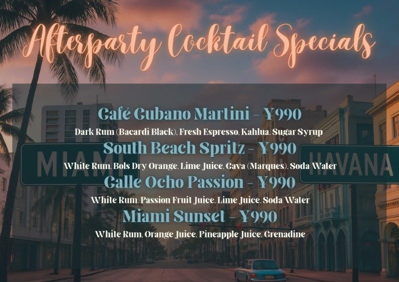 Various colorful cocktails and shots on a wooden surface, including orange, blue, and green drinks with fruit garnishes.