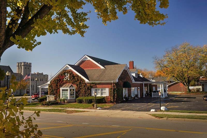 Exterior and interior photos of Hultgren Funeral Home and Cremation Center Wheaton Location

