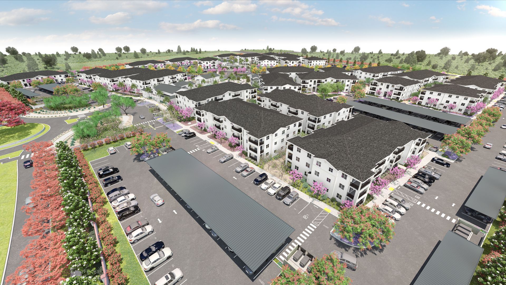 Aerial rendering of a multi-unit apartment complex with parking, landscaping, and trees.