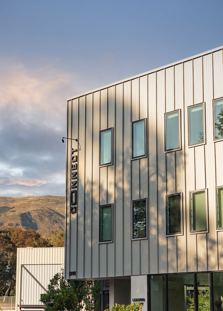 A large building with a sign on the side that says conroy