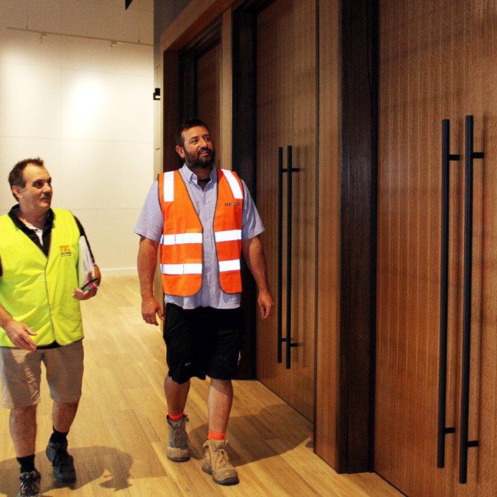 Two Men Looking At Doors - Door Specialist in Wauchope, NSW