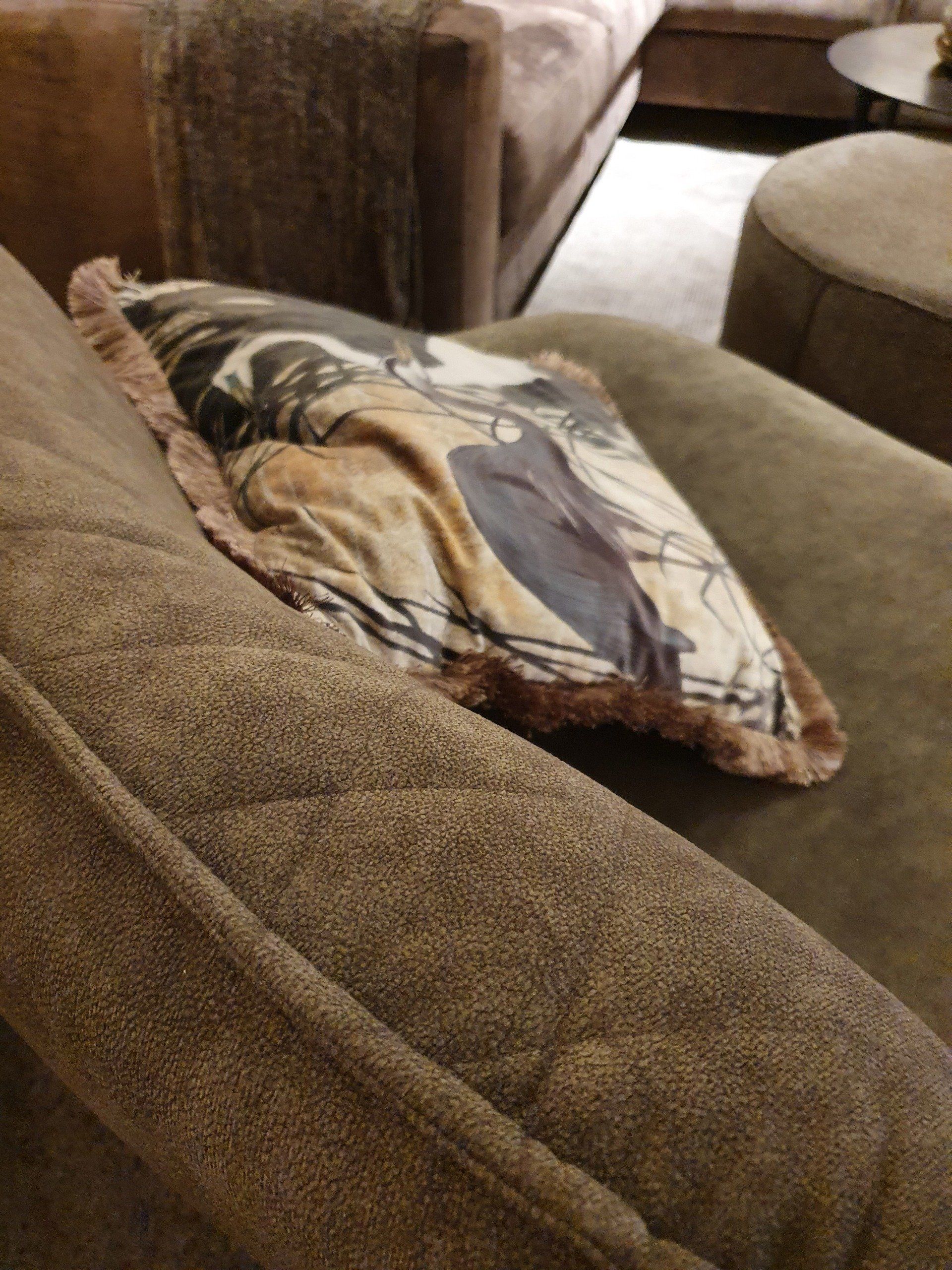 Draaifauteuil zonder armleuning, met draaipoot metaal zwart en groene bekleding met ruitstiksel en bies