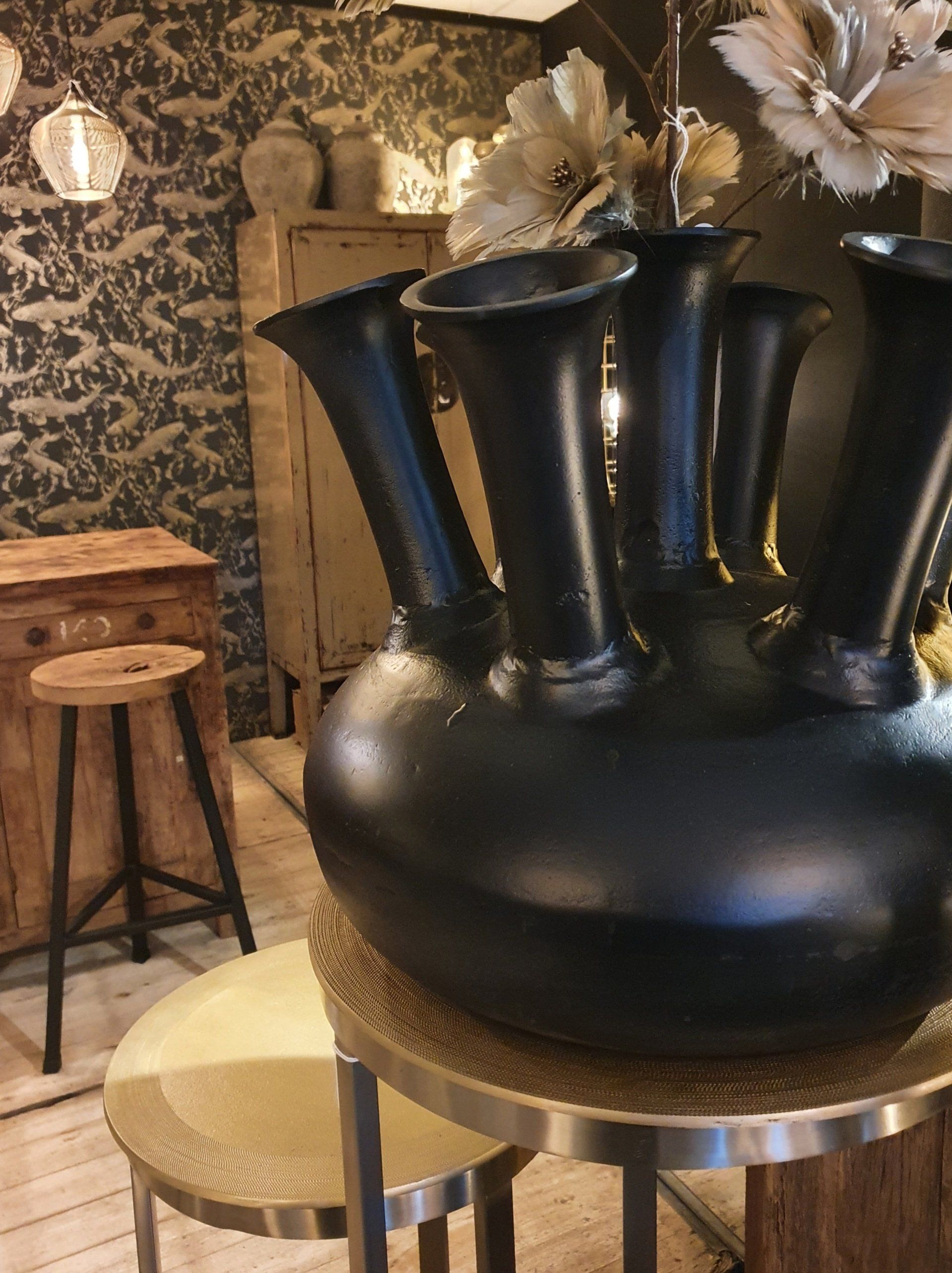 woonaccessoires theelichthouder en vaas roze, plaid met dessin groen, presse papier