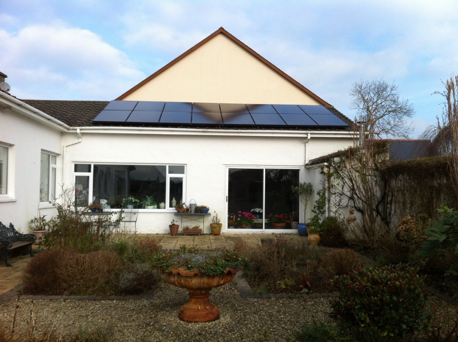 a nice cottage with solar panels