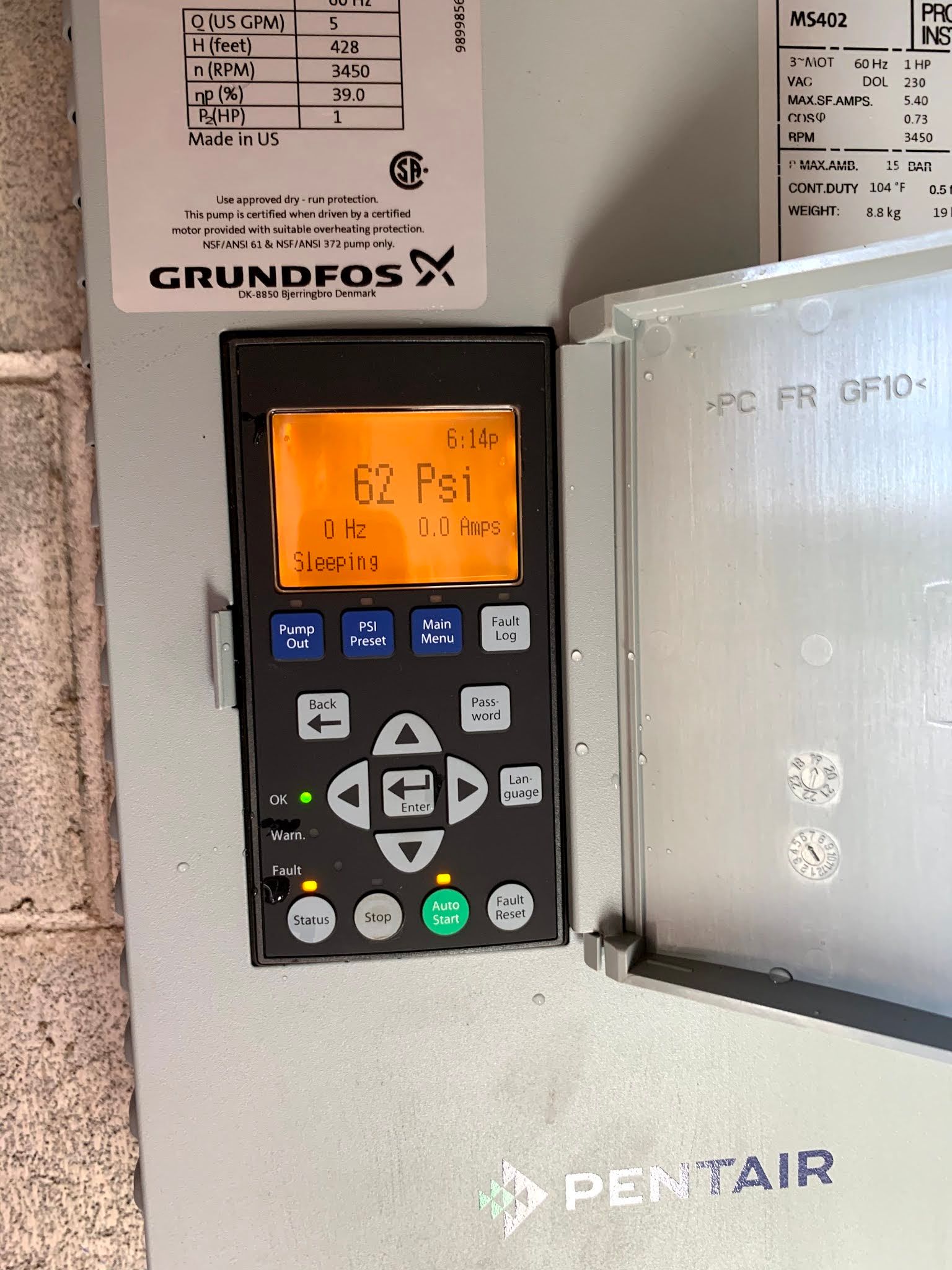 A control panel with a display that says 52 psi on it