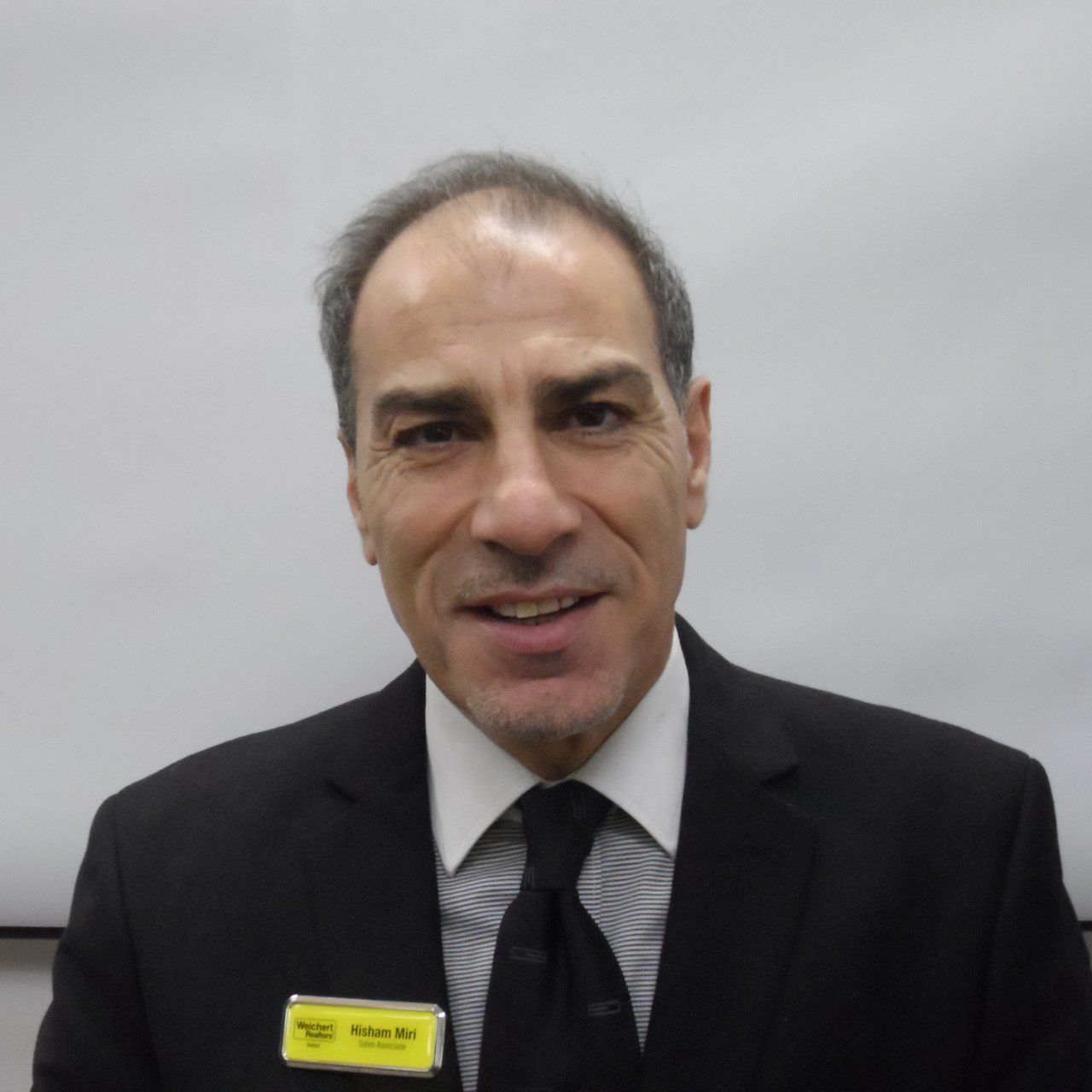 headshot of Hisham Mirri