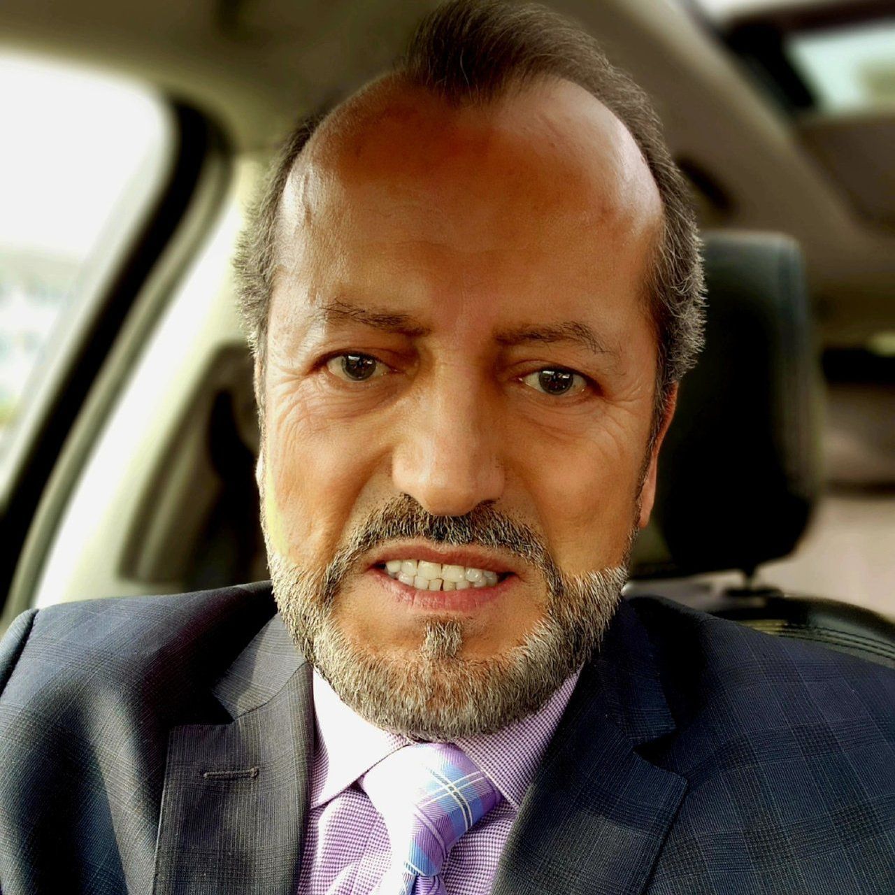 headshot of Akil Mehanna