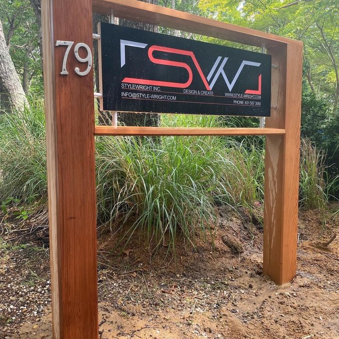 Wooden sign with address 