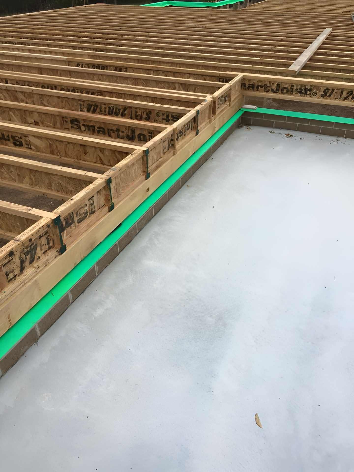 The Floor of a House is Being Built With Pest Prevention — Precision Pest Services in Wherrol Flat, NSW