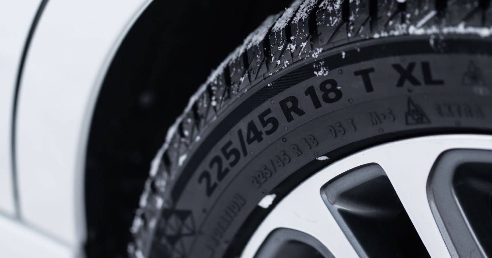 a close up of a tire that showing the tire size to accompany an article about this topic