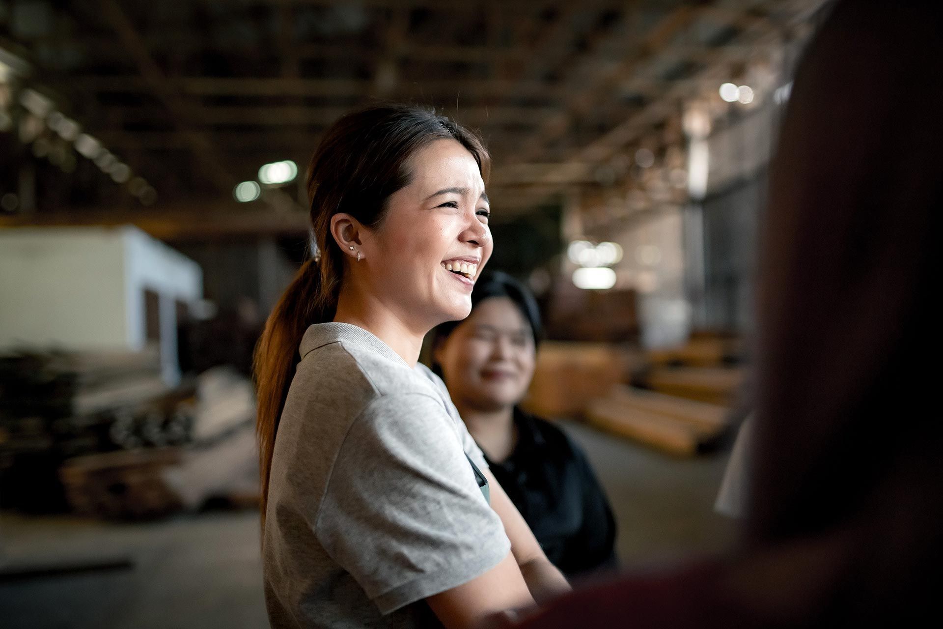 The Green Light Studio team visiting a local Chiang Mai bespoke wood furniture producer