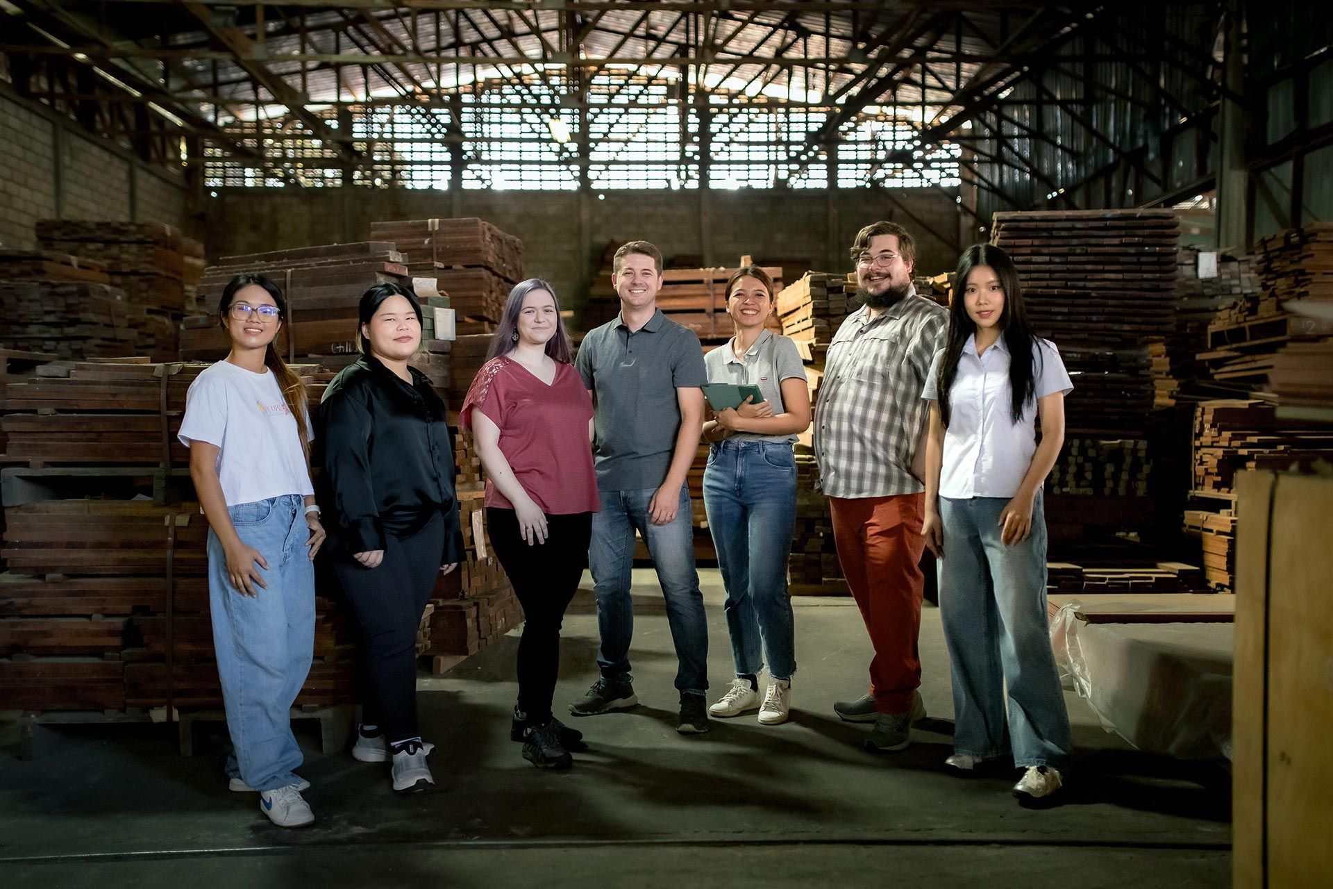 The Green Light Studio team visiting a local Chiang Mai bespoke wood furniture producer