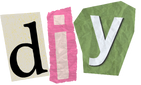 The word diy is cut out of a piece of paper.
