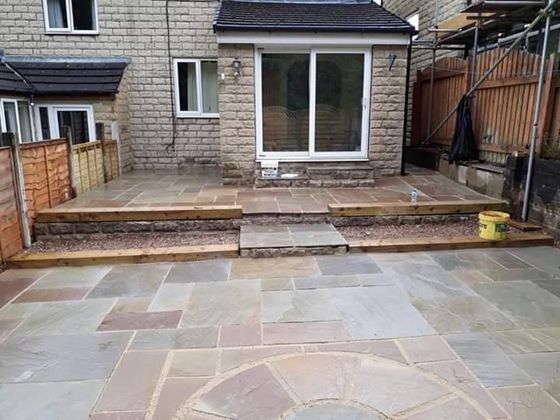Three level patio with Indian stone for two levels and gravel in one