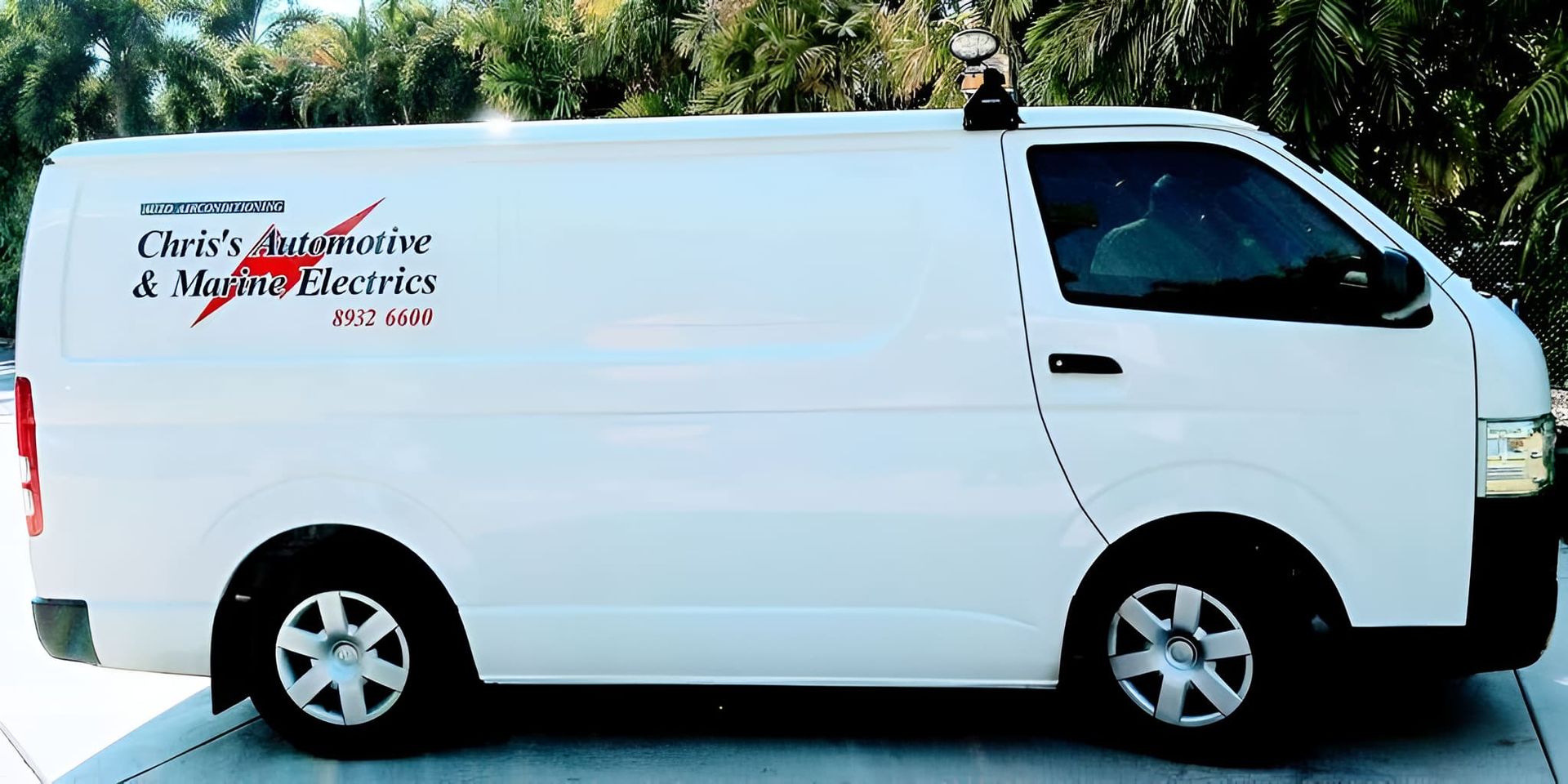 A White Van Is Parked On The Side Of The Road — Chris's Automotive & Marine Electrics In Marlow Lagoon, NT