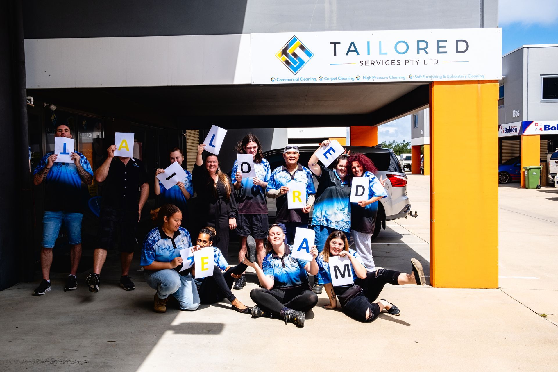 A Tailored Van Is Parked On The Side Of The Road — Tailored Services in Mackay Harbour, QLD