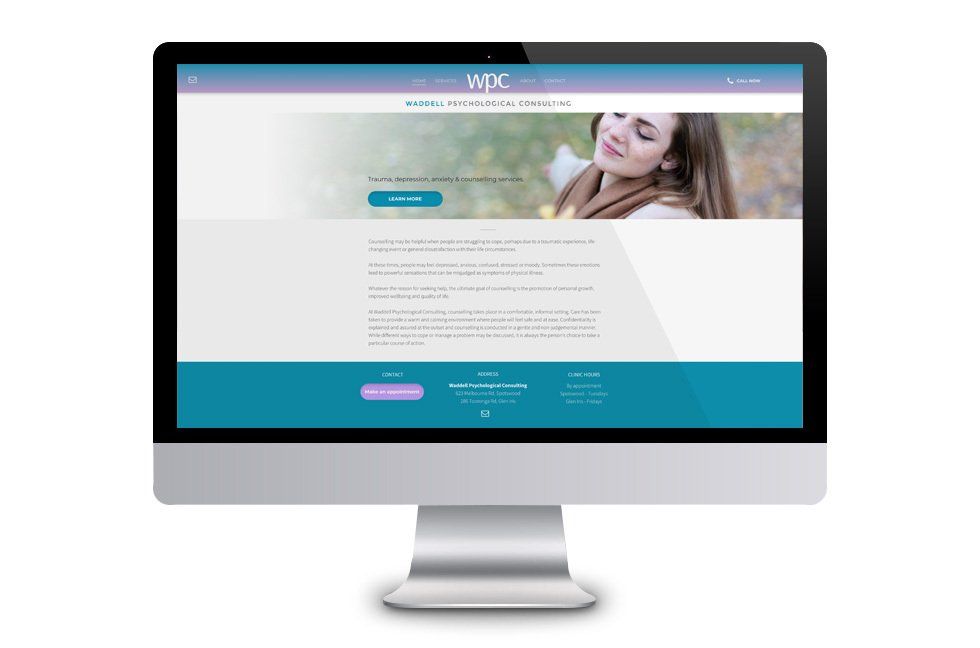 A computer monitor with a woman on the screen.