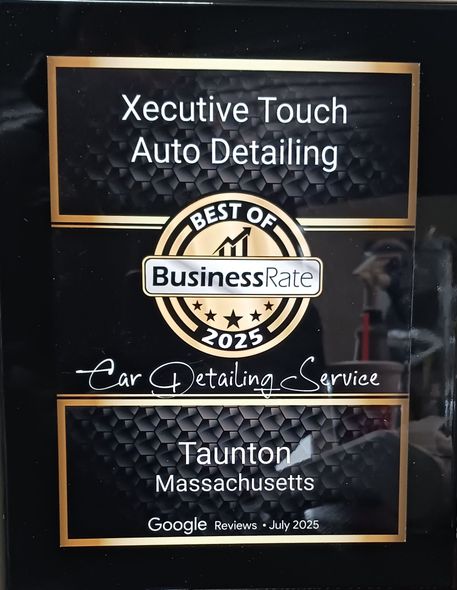 Black-and-gold sign for Xecutive Touch Auto Detailing in Taunton, Massachusetts, with Businessrate Best of 2025 badge