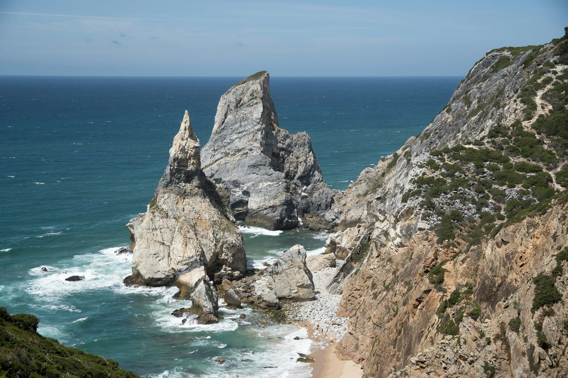 Rocky cliffs and sea stacks along the Atlantic coast.