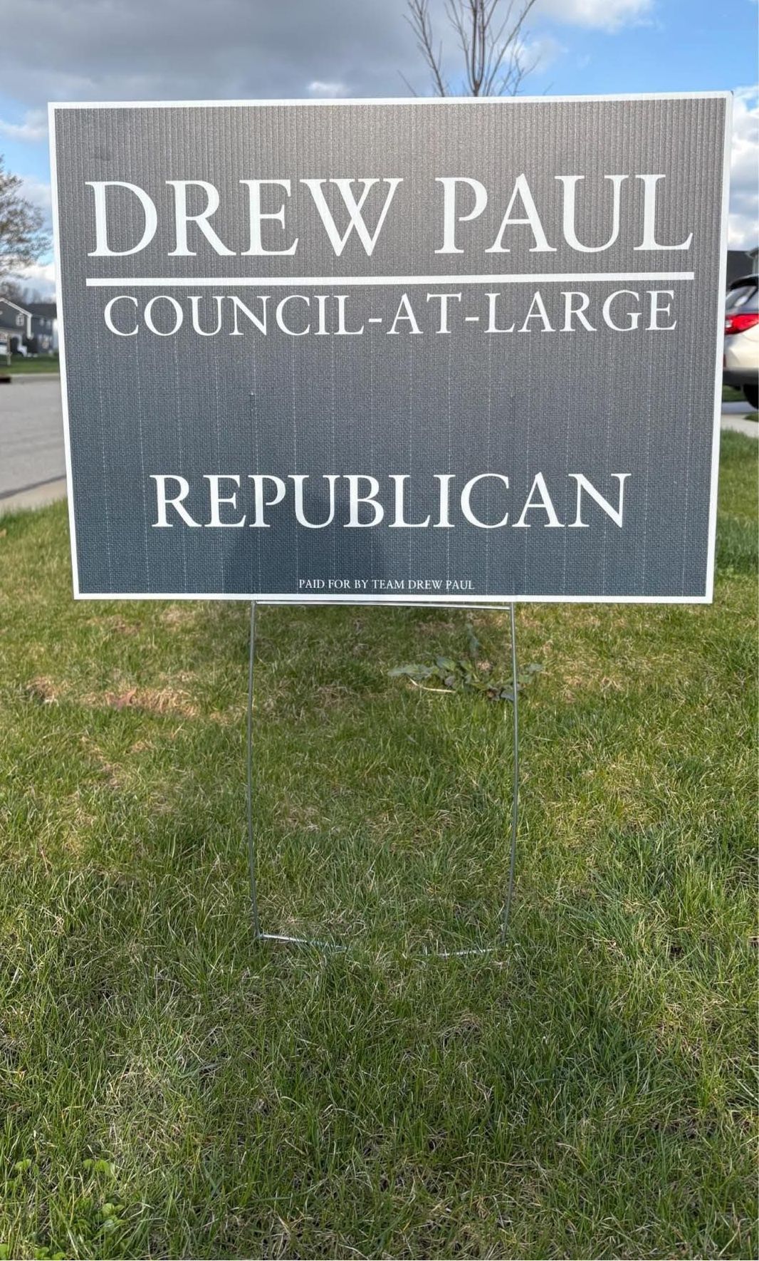 A political yard sign that says Drew Paul Council at large. Republican.