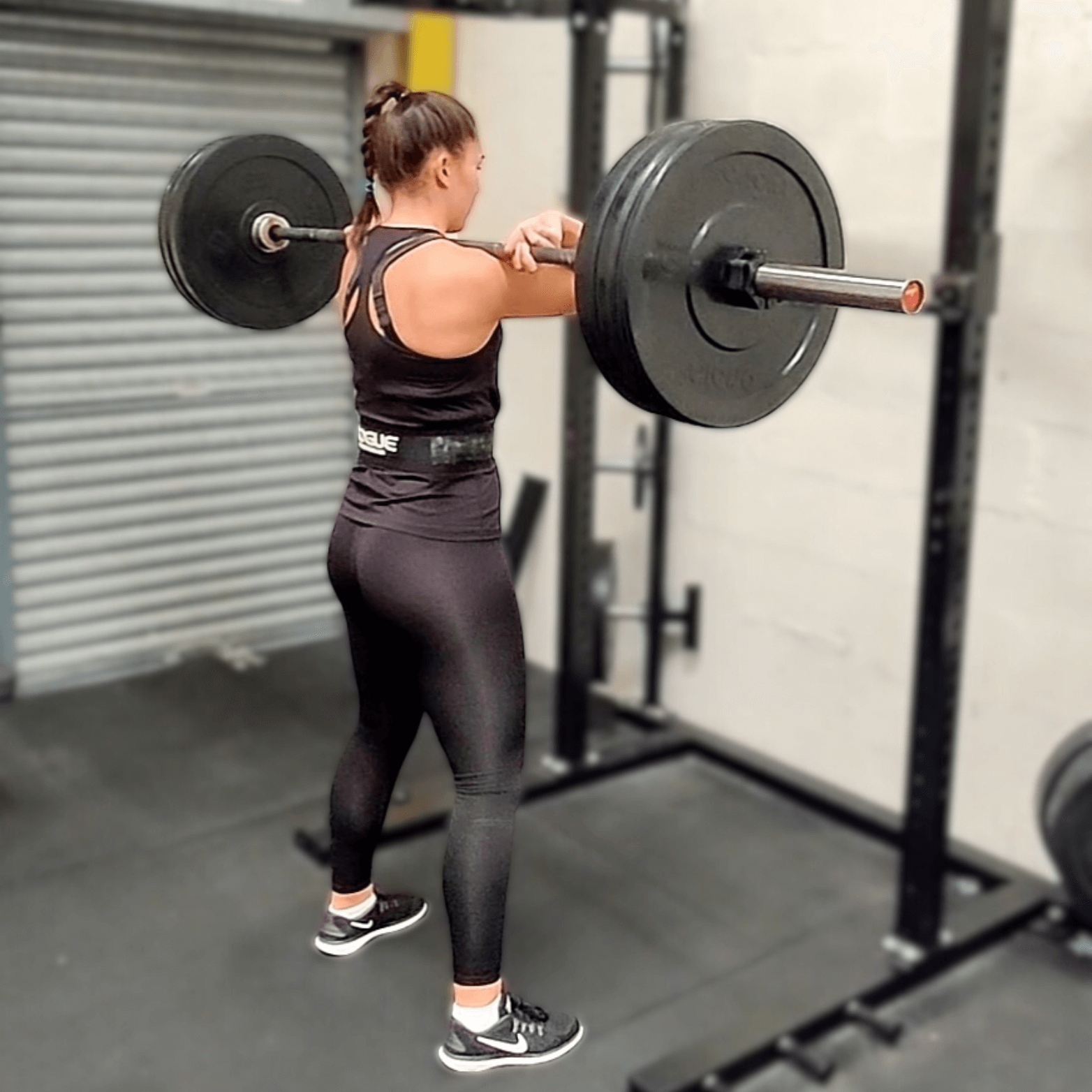 Bootcamp Glasgow member front squatting at Learn to Lift Bootcamp